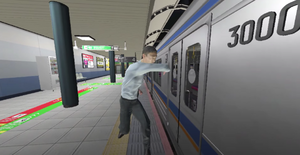 扉を殴る